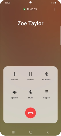 Press the end call icon.