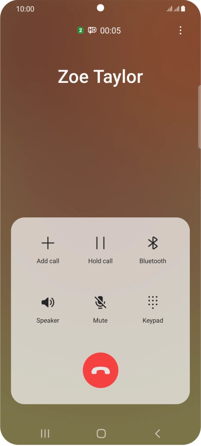 Press the end call icon.