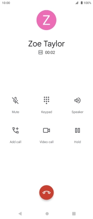 Press the end call icon.