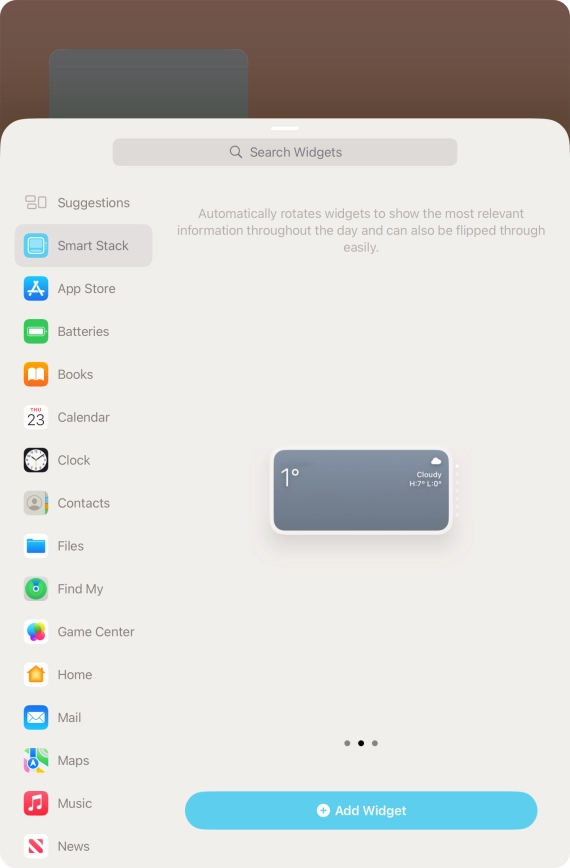 Slide your finger right or left on the screen to select the required widget size.