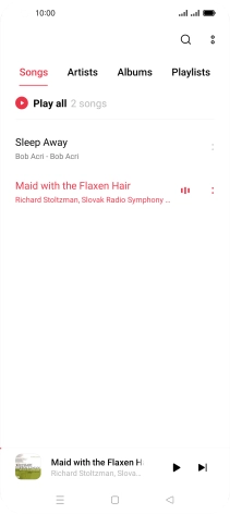 Press the song title at the bottom of the screen.