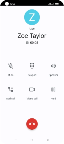 Press the end call icon.