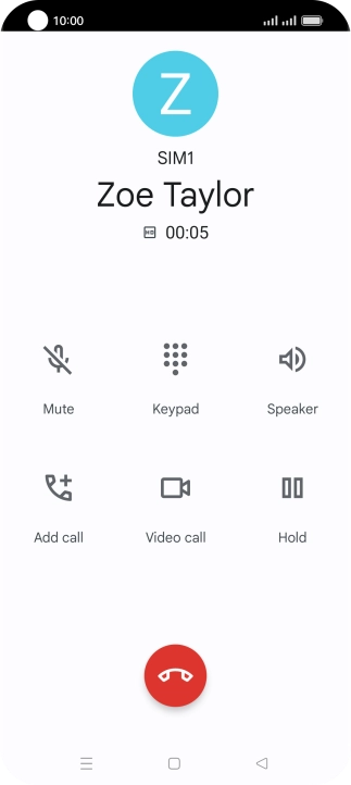 Press the end call icon.
