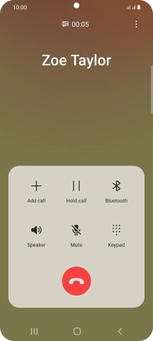 Press the end call icon.