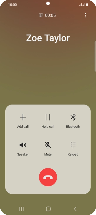 Press the end call icon.