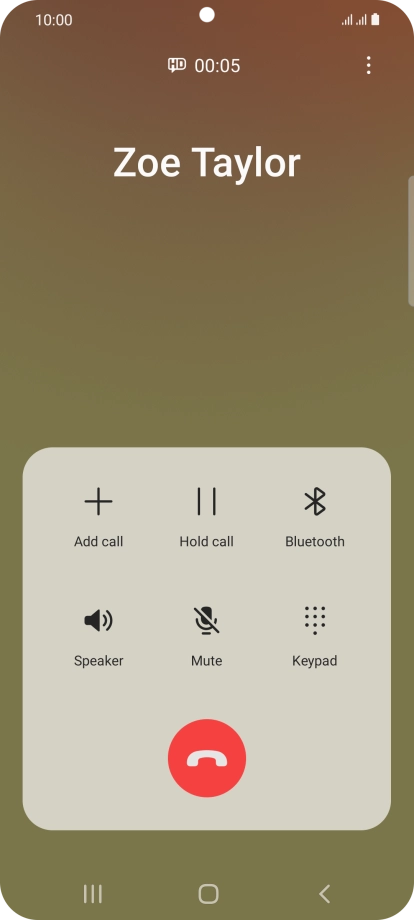 Press the end call icon.