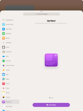 Slide your finger right or left on the screen to select the required widget size.