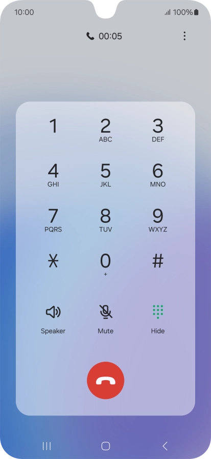 Press the end call icon.