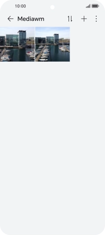 Press and hold any picture or video.