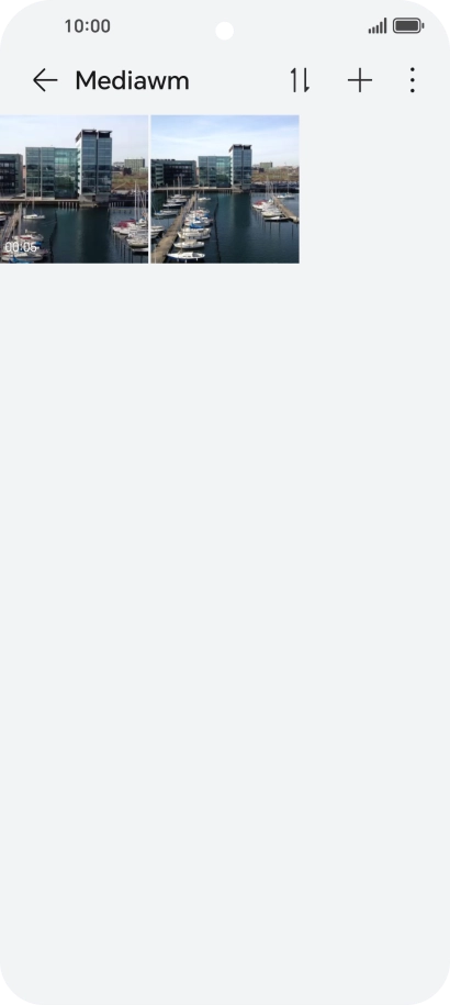 Press and hold any picture or video.