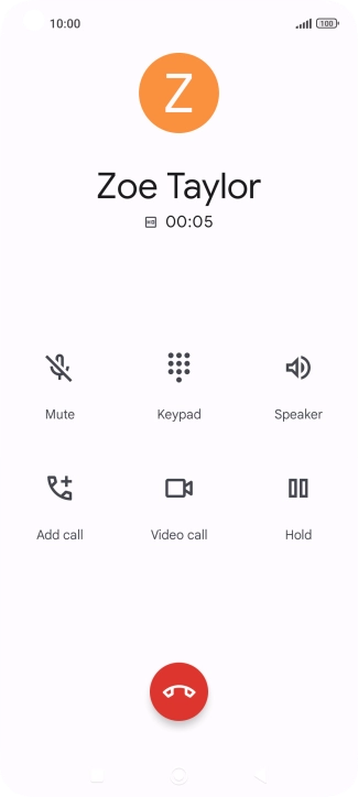 Press the end call icon.