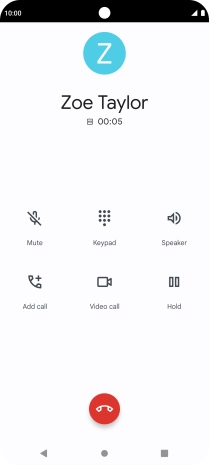 Press the end call icon.