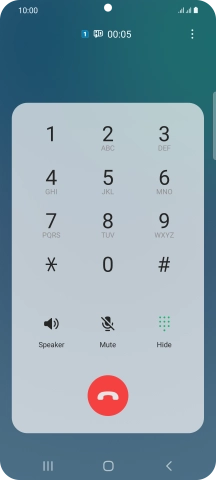 Press the end call icon.
