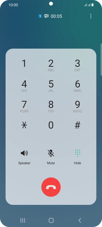 Press the end call icon.