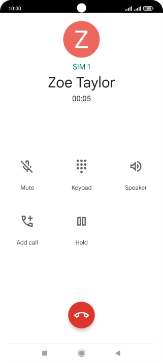 Press the end call icon.