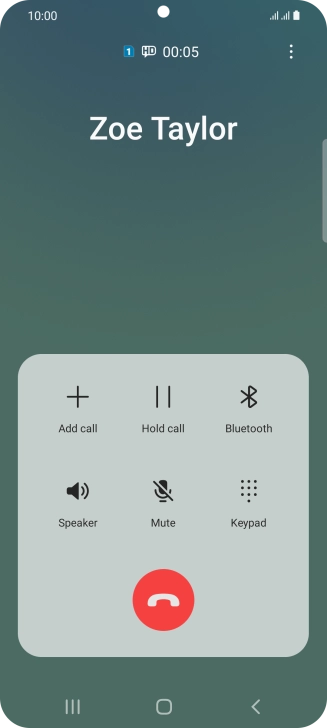 Press the end call icon.