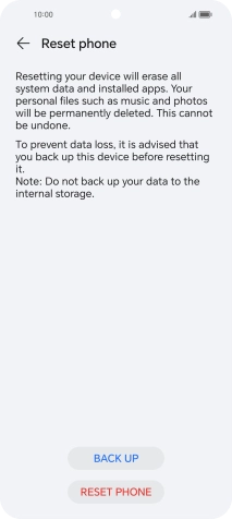 Press RESET PHONE. Wait a moment while the factory default settings are restored. Follow the instructions on the screen to set up your phone and prepare it for use.