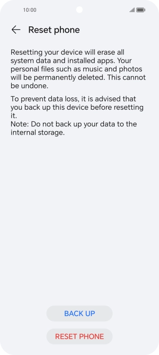 Press RESET PHONE. Wait a moment while the factory default settings are restored. Follow the instructions on the screen to set up your phone and prepare it for use.