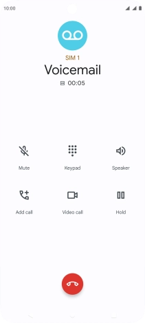 Press the end call icon.