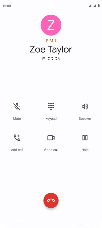 Press the end call icon.