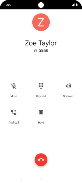 Press the end call icon.