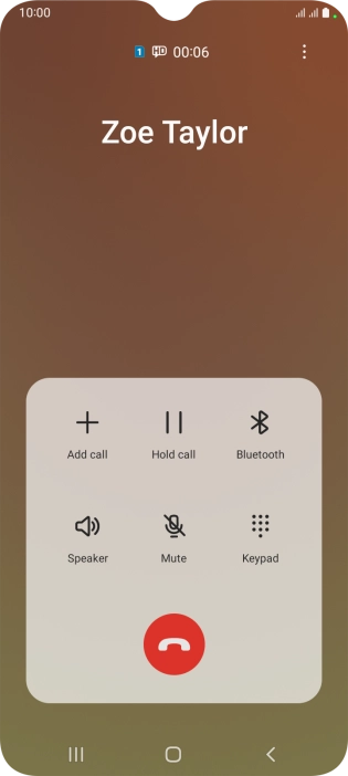 Press the end call icon.
