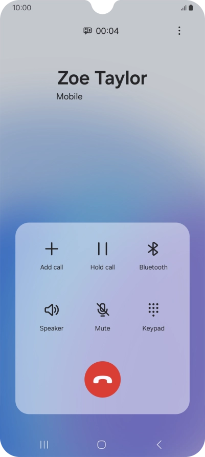 Press the end call icon.