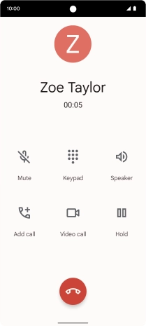 Press the end call icon.