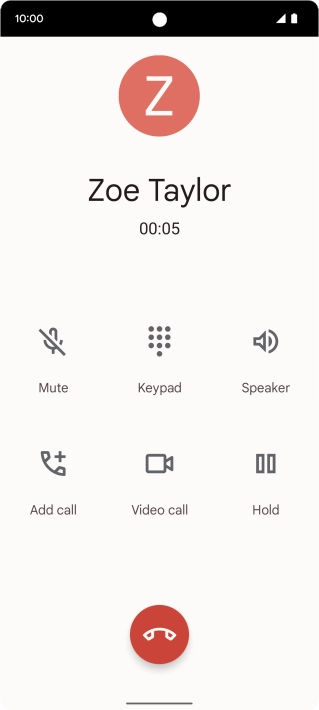 Press the end call icon.