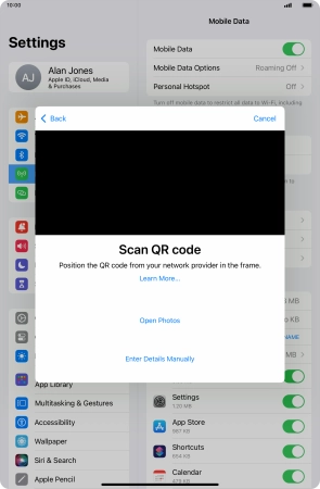 Place the QR code you've received inside the tablet camera frame to scan the code. Your eSIM is transferred to your new tablet over the internet.