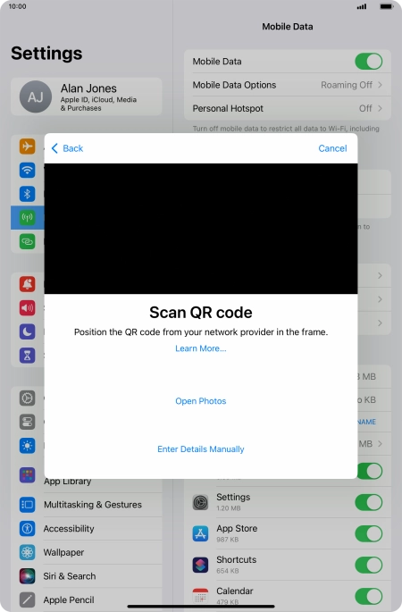 Place the QR code you've received inside the tablet camera frame to scan the code. Your eSIM is transferred to your new tablet over the internet.