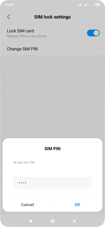 Key in the new PIN again and press OK.