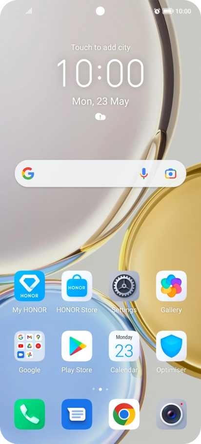The alarm icon shows that the alarm is set.