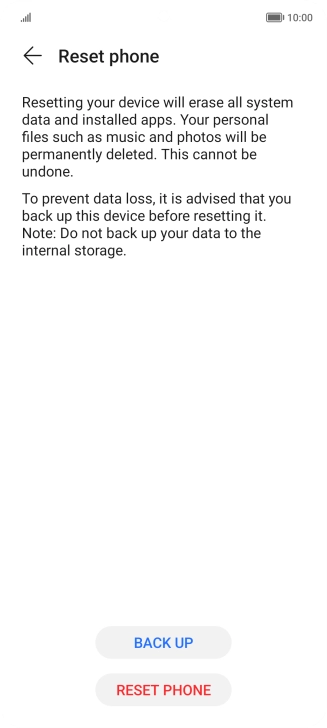 Press RESET PHONE. Wait a moment while the factory default settings are restored. Follow the instructions on the screen to set up your phone and prepare it for use.