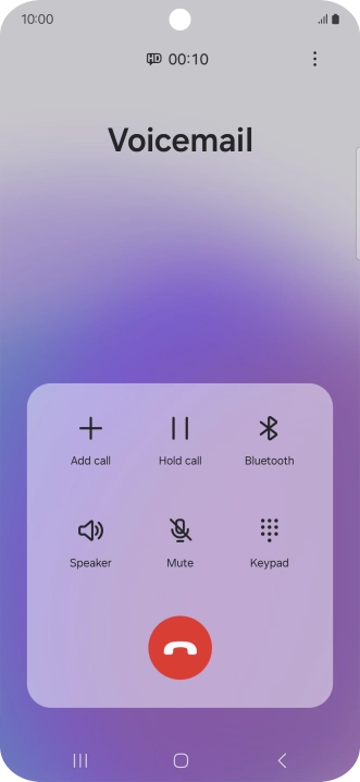 Press the end call icon.