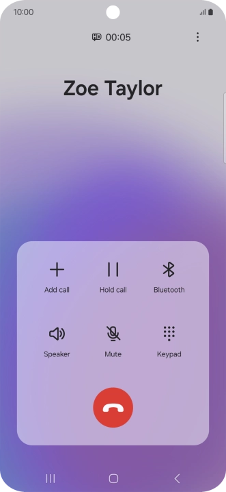 Press the end call icon.
