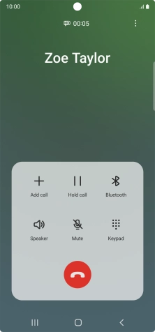 Press the end call icon.