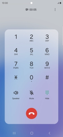 Press the end call icon.