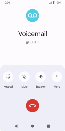 Press the end call icon.