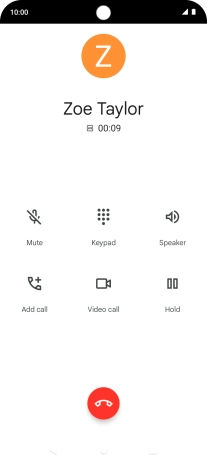 Press the end call icon.