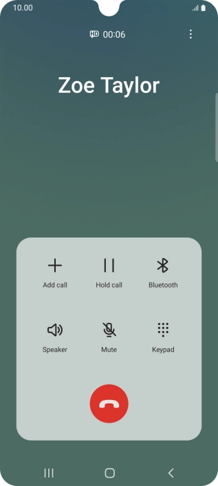 Press the end call icon.