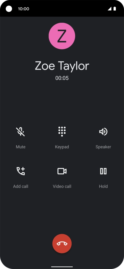 Press the end call icon.