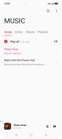 Press the song title at the bottom of the screen.