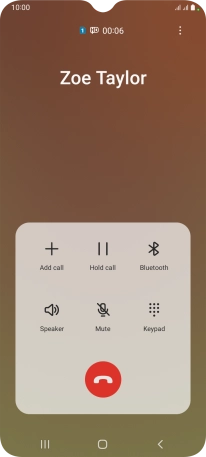 Press the end call icon.