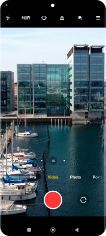 If the video recorder is turned on, press Photo.