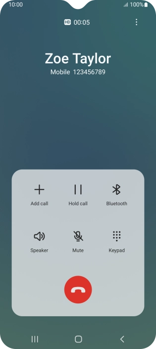 Press the end call icon.