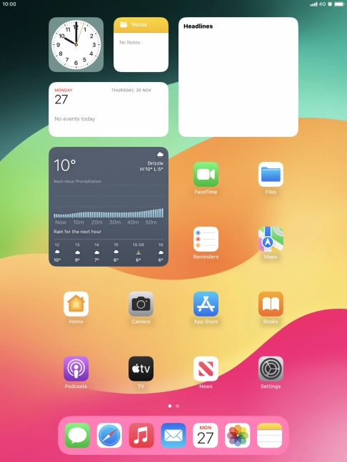 The alarm icon shows that the alarm is set.