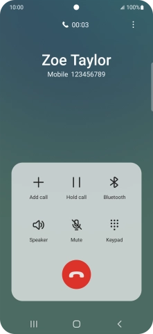 Press the end call icon.