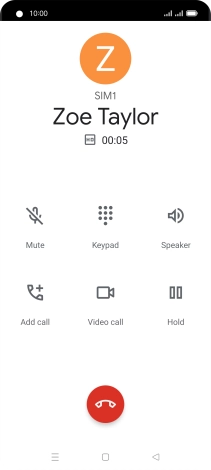 Press the end call icon.