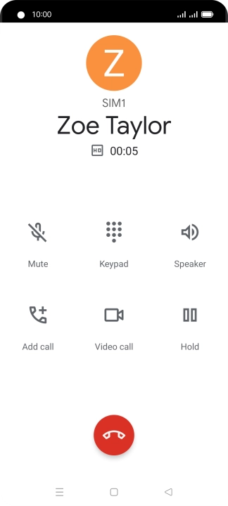 Press the end call icon.